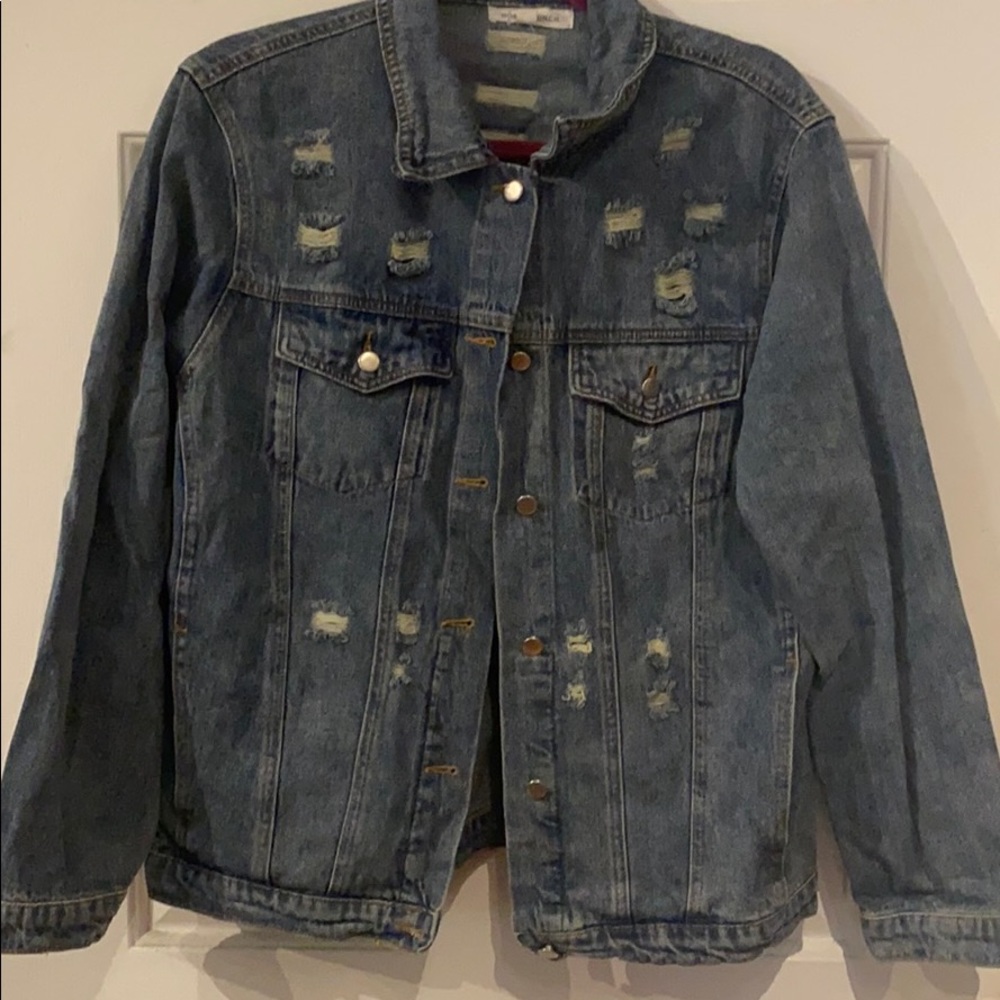 Distressed denim jacket